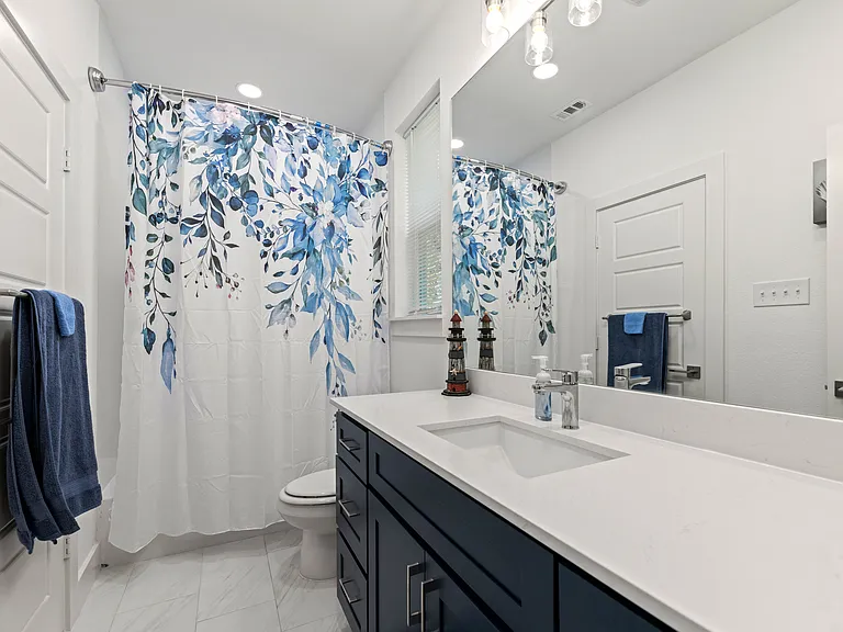 This "Jack n Jill" full bath is accessed from both bedrooms.