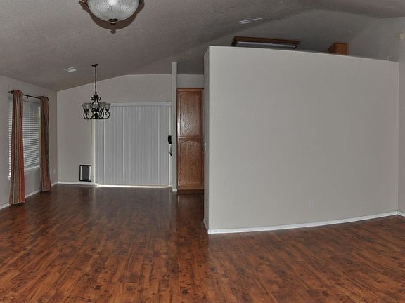 View of the Living and Dining Room from the Bay Window
