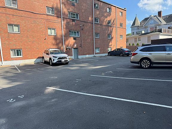 Rear Parking Lot-Assigned Parking