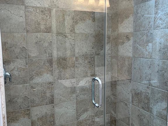 EXTRA LARGE TILED SHOWER IN BATH 1