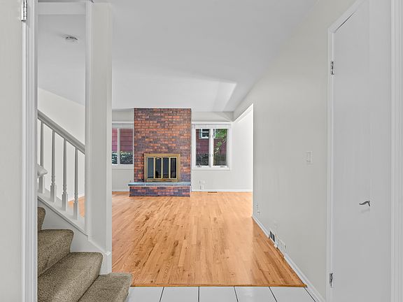 Re-finished wood floors; operating fireplace