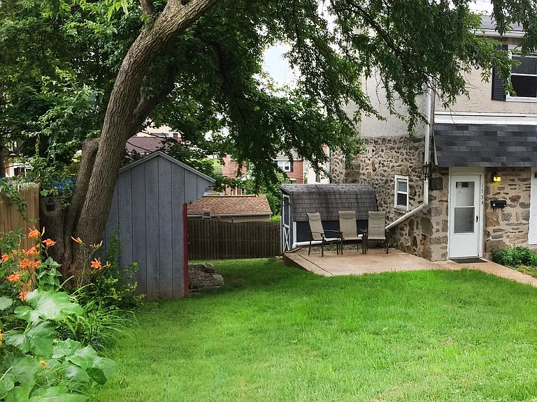 Private patio area next to entrance.