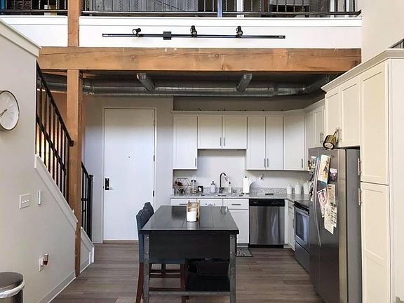 Kitchen, loft above- center island stays with unit