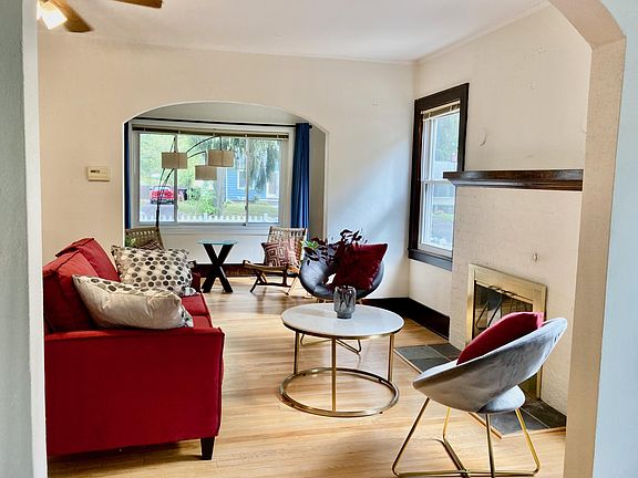 View from the dining room through the living room and sunroom.