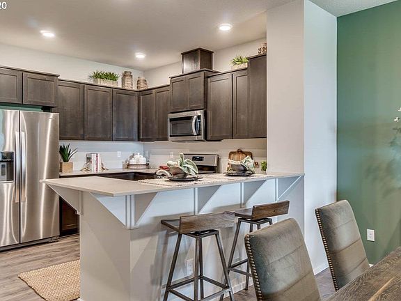 Kitchen with Quartz Counter; Breakfast Bar