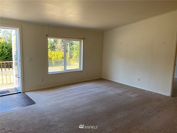 view to front door, large living room 