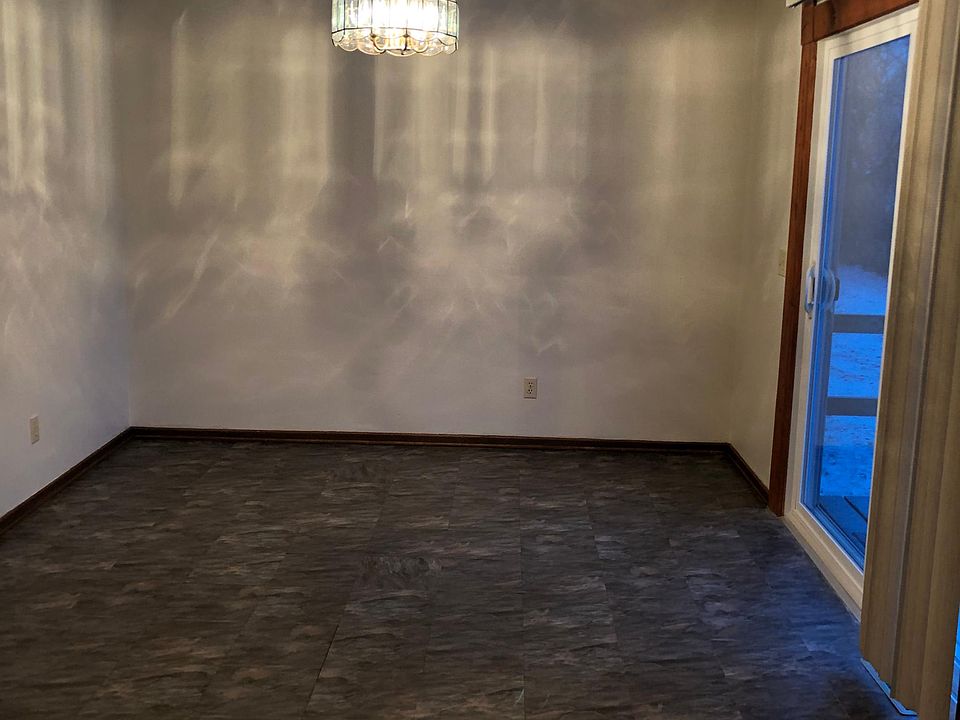 Dining area of kitchen with door to patio