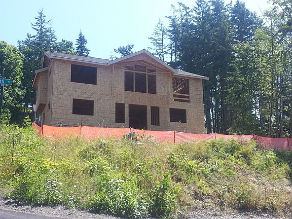 Exterior. Decks to come.