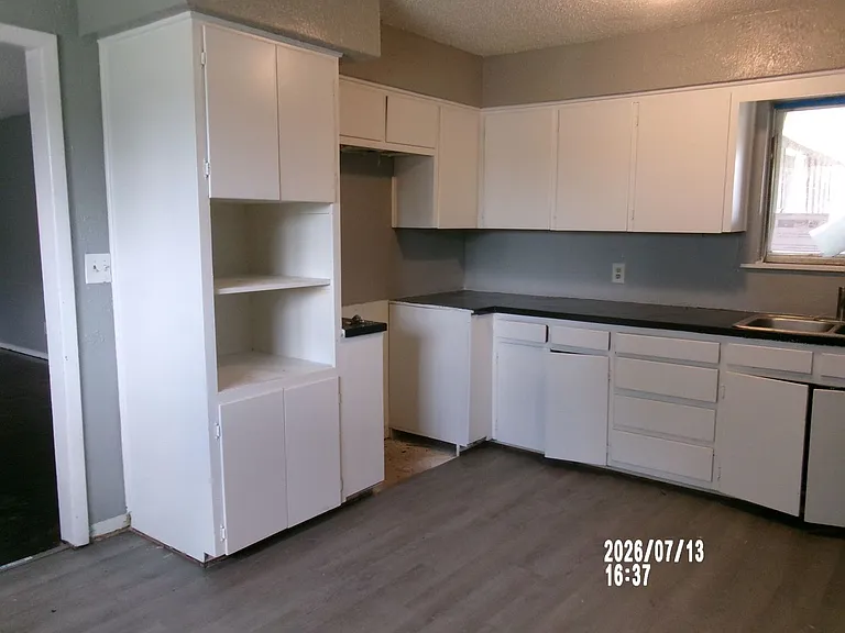 1319 NW Carroll Dr — Photo 8