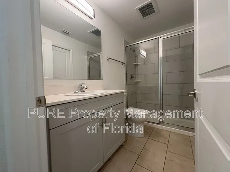 318 NE 7th Ter #102 — Photo 16