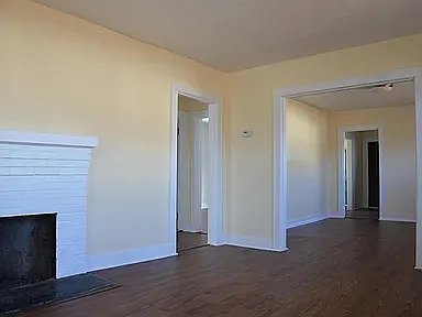 Living room looking toward dining room and hall to left