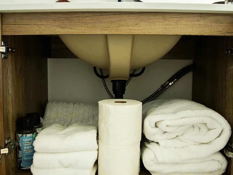 Towels and starter bathroom amenities shown