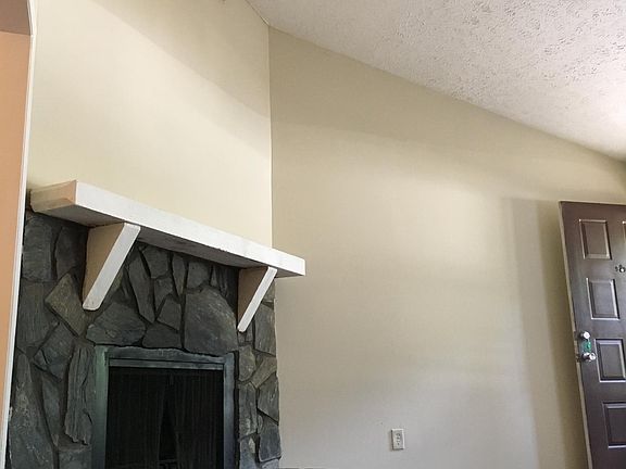 Fireplace with vaulted ceiling