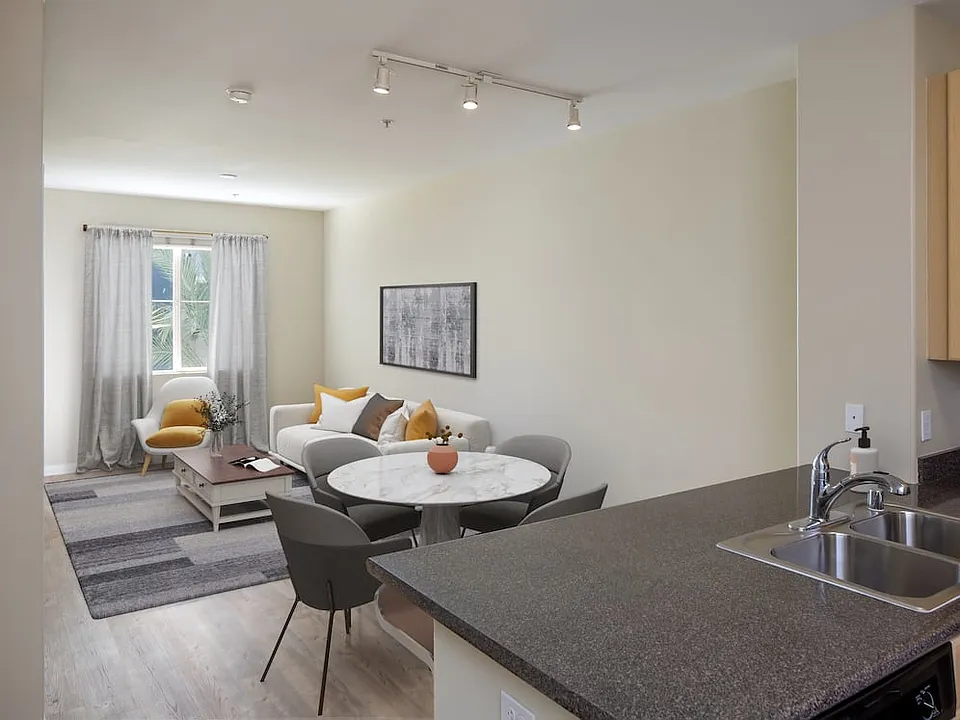 Kitchen, living, dining areas with hard surface flooring
