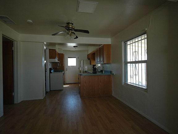 OPEN FLOOR PLAN W/DINING AREA OFF KITCHEN AND FAMILY ROOM PERGO FLOORS 
