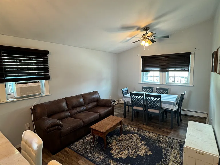 Living room and bar stools.