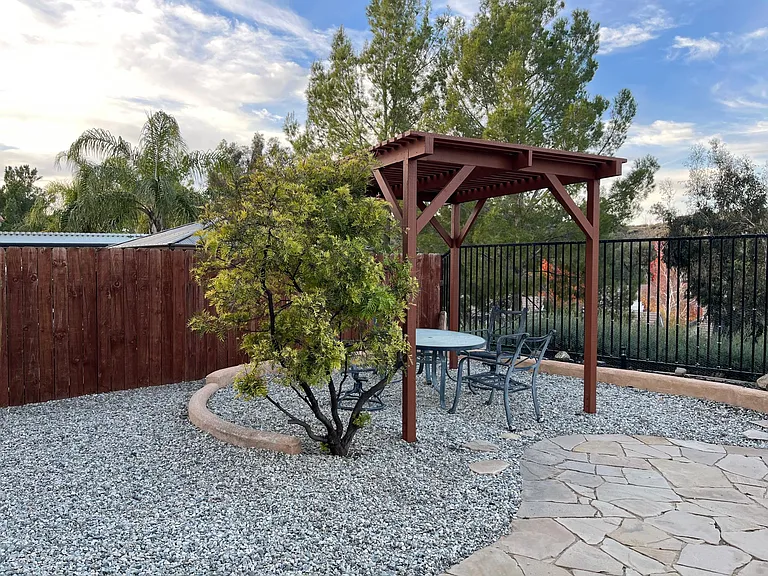Enjoy your open views and morning cup of coffee under the pergola.