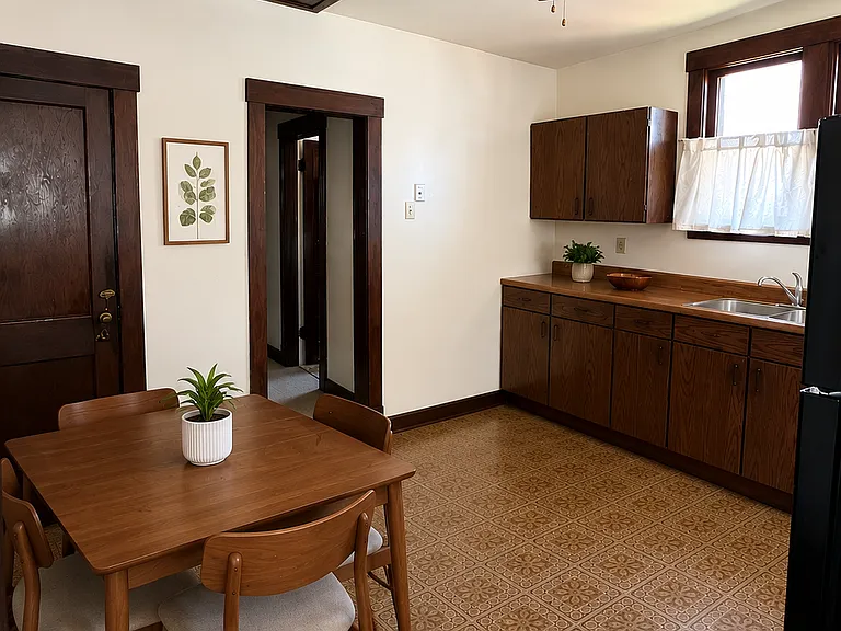 Kitchen upon entering home from the backdoor. Staged virtually for ideas.