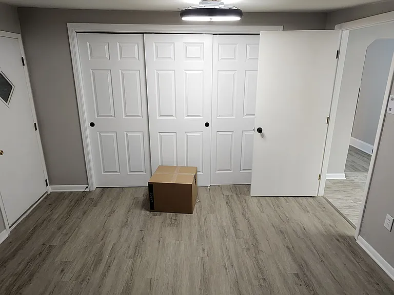 Large master closet with 3 doors
