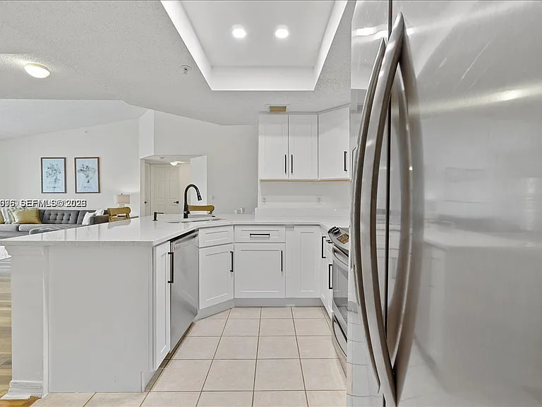 5065 Wiles Rd #308 — Photo 11