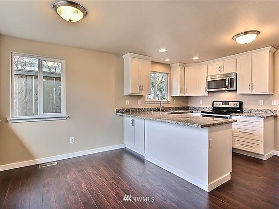 Dining area with breakfast bar and storage