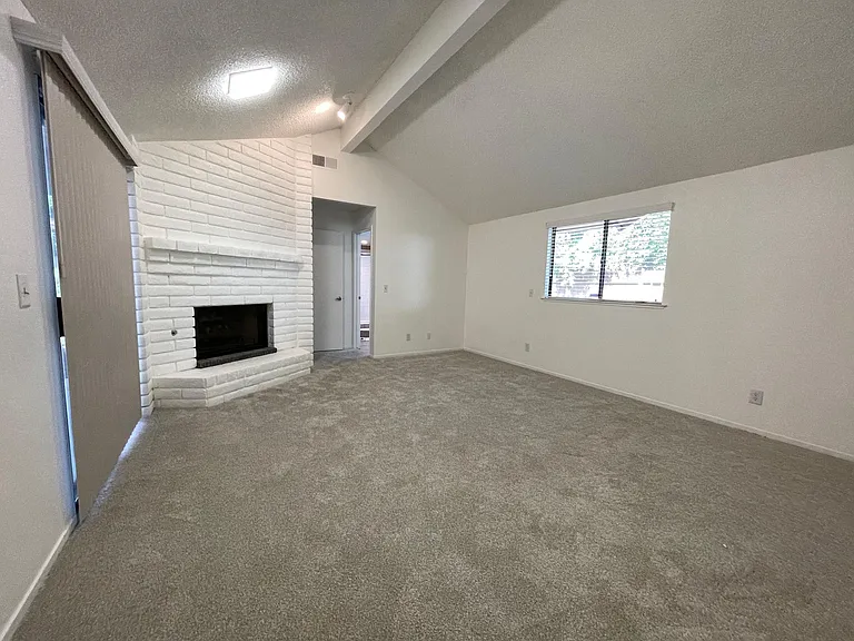Master bedroom with bathroom and large walk-in closet.