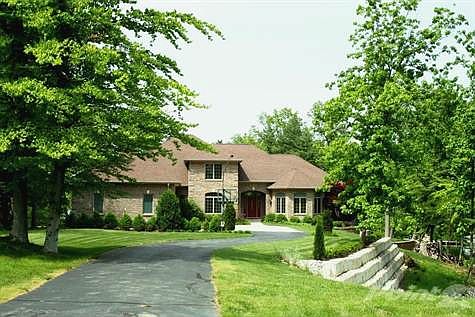 Spectacular, custom home completed in 2008 by Mike T Kirsch on Foxcliff Lake.