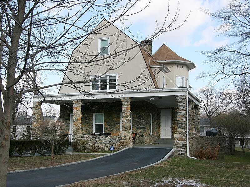 Turn-of-the-century Stone and Stucco Victorian.