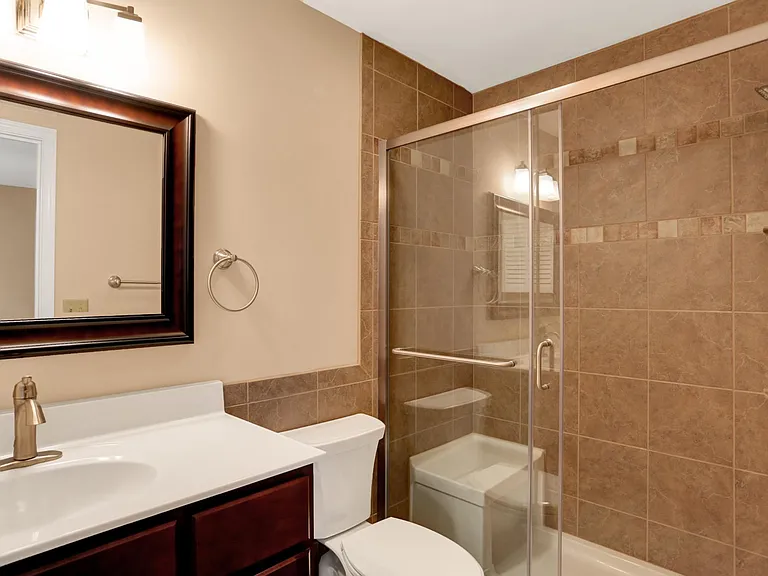 Master bath in both the modern contemporary units