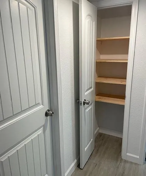 Hallway linen closet carriage doors