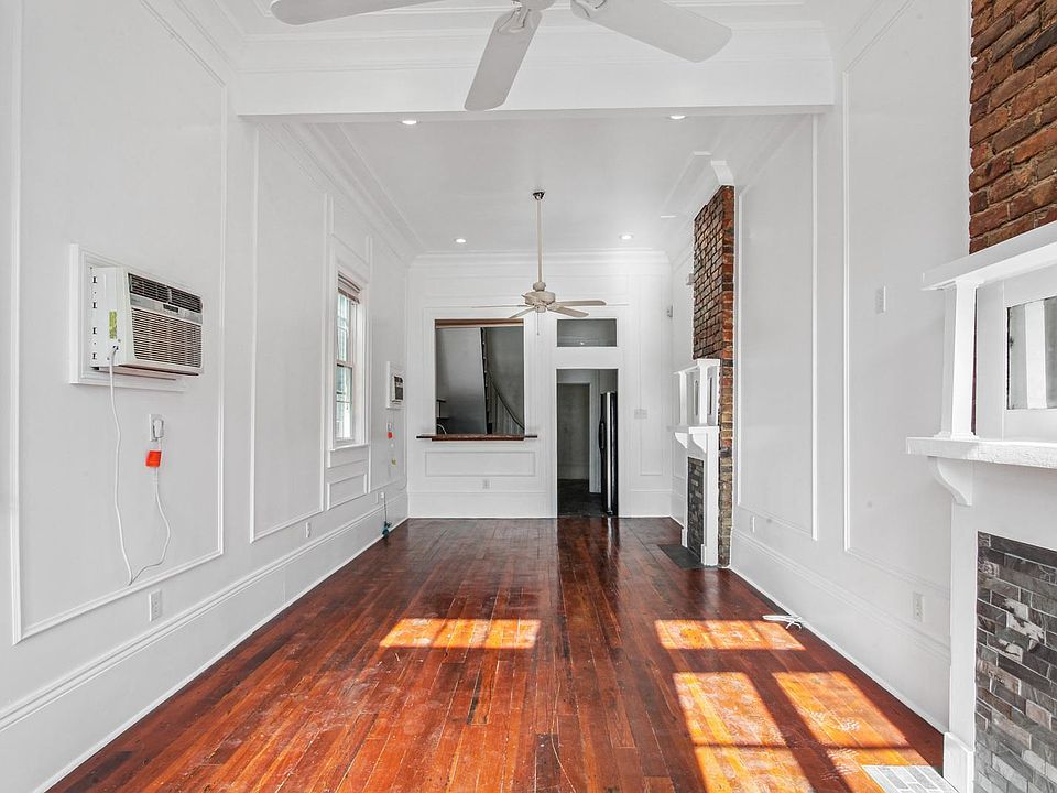 High ceilings, open floor plan, living room to the dining area.