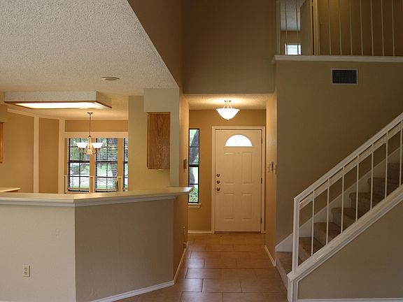 Looking toward the front door. The main level also includes a powder room and large inside laundry room with hookups.