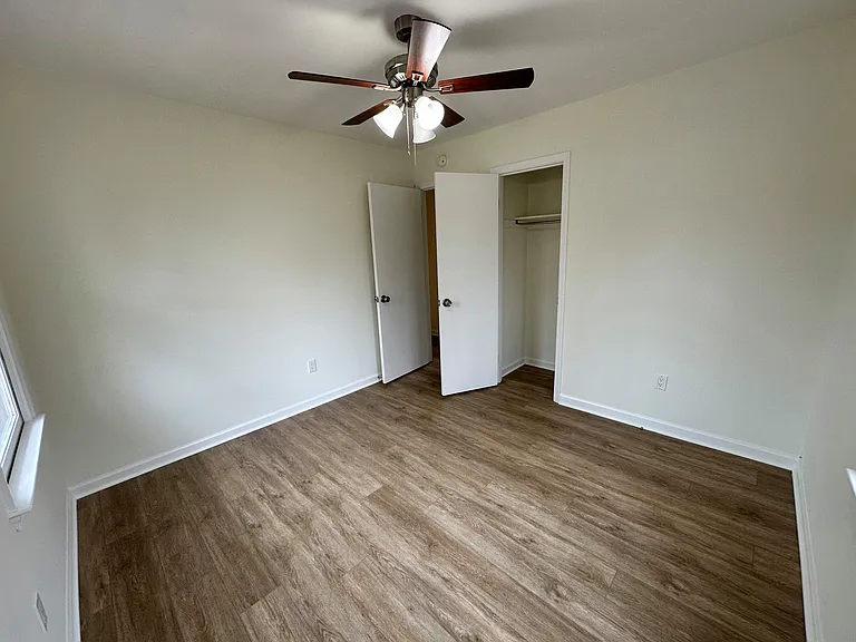 Additional photo of Bedroom #2 with view of the front and side yard.