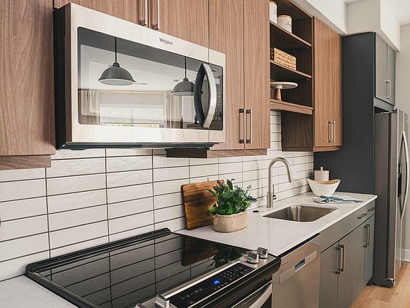 Discover modern sophistication in our homes with sleek cabinets featuring soft-close drawers and under-cabinet lighting.