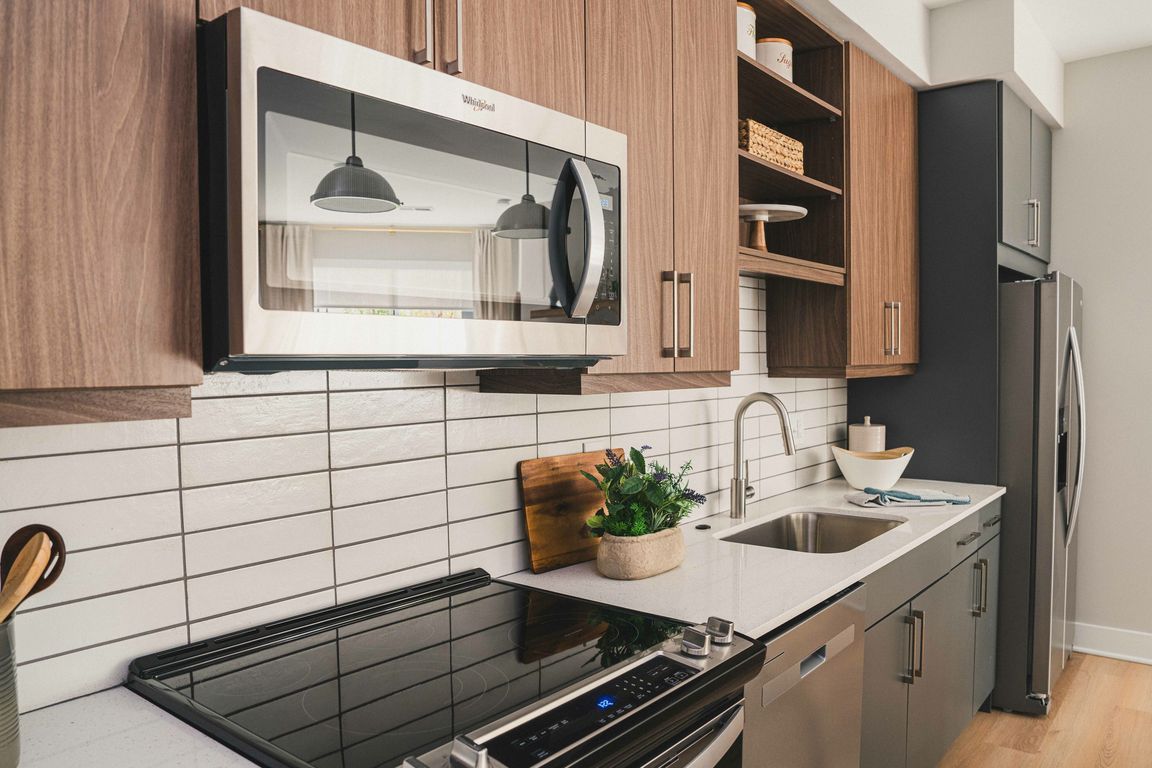 Discover modern sophistication in our homes with sleek cabinets featuring soft-close drawers and under-cabinet lighting.