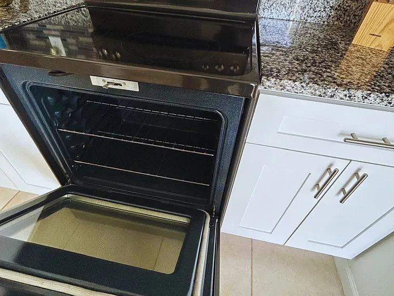 Modern electric stove and oven for home-cooked meals.