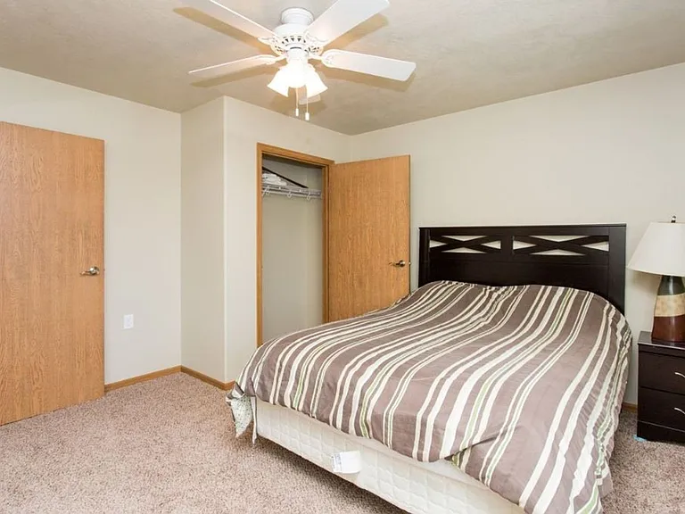 Welcome to Northdale Apartments, where comfort meets modern living. This spacious bedroom features a cozy atmosphere, ample storage, and stylish design. Your ideal home awaits. Schedule a tour today and see for yourself!