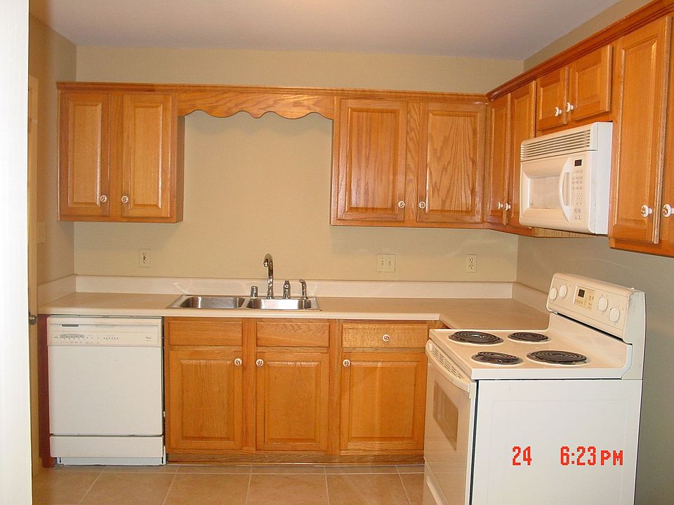 Newly painted kitchen and new tile floor 