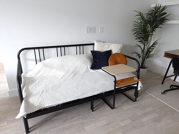 Daybed can be transformed into a queen sized bed.