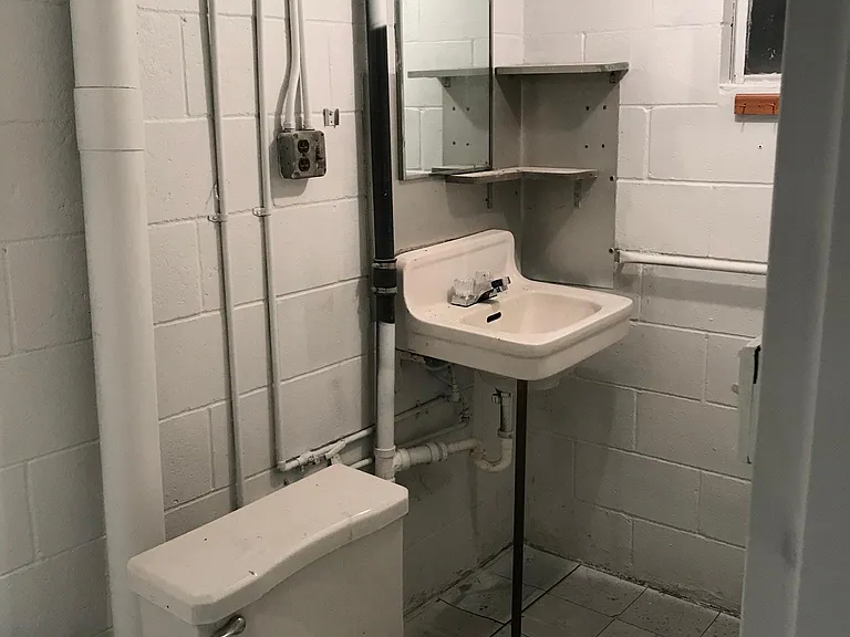 Basement full bathroom, shower is to the left of this picture.
