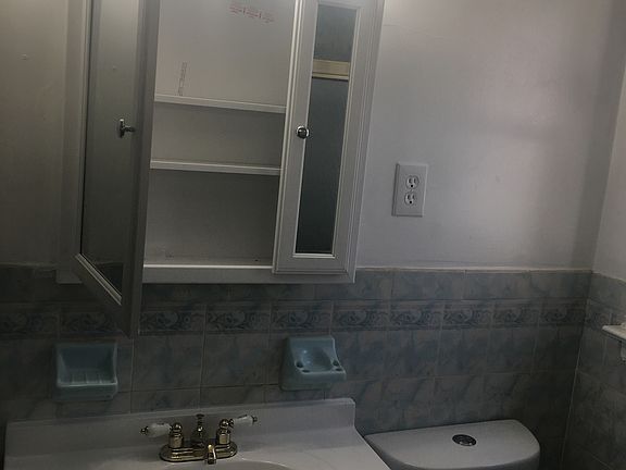 New sink and medicine cabinet