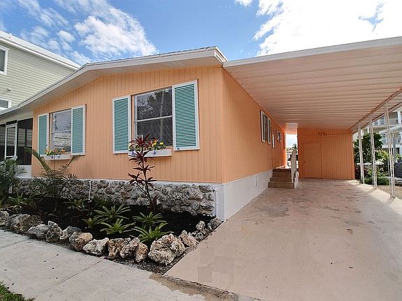 Carport with shed