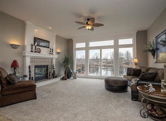 Sit by the Fireplace & Enjoy the View of the Water