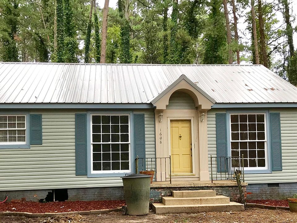 New roof , new vinyl siding, wooded lot with mature trees