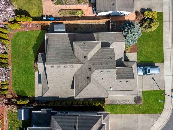 Aerial view showing beautifully landscaped yard