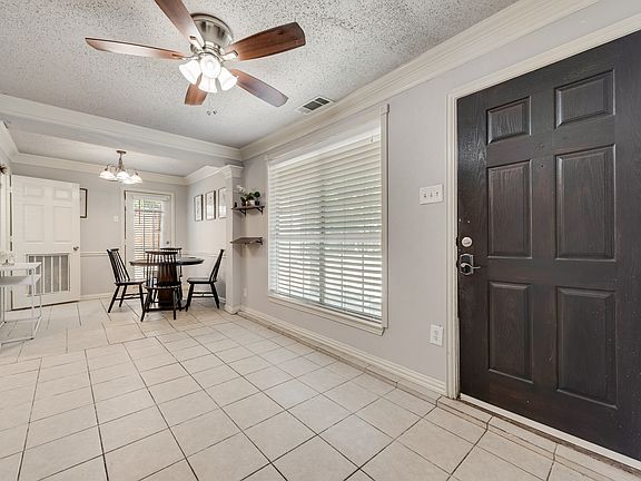 Enter your open floor concept with kitchen and living area.