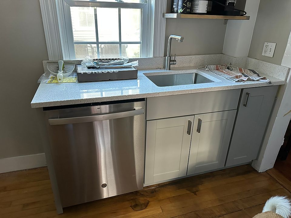 Kitchen with dishwasher. Engineered stone counter tops. Newly renovated