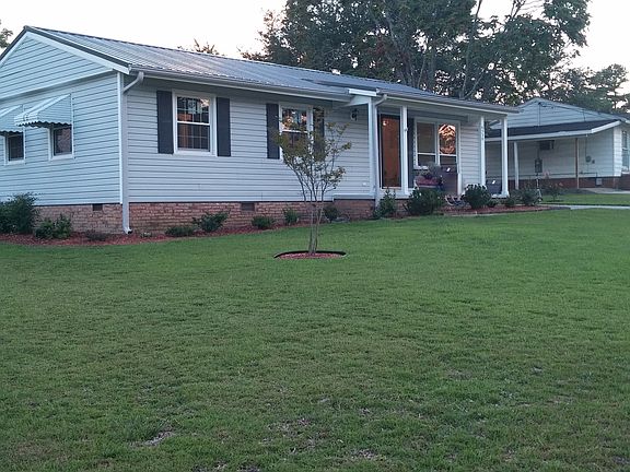 Front Yard with beautiful trees and lawn