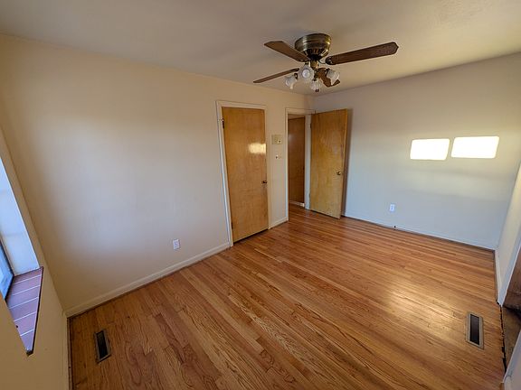 Bedroom with access to back porch