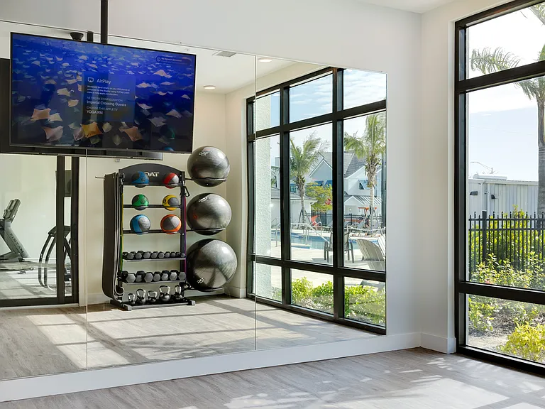 Imperial Crossing Luxury Apartment Homes community fitness yoga area.